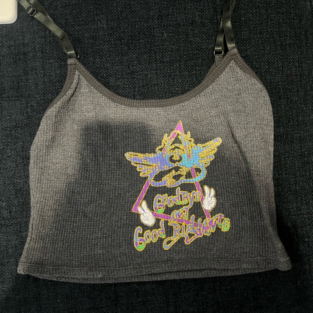 Boys lie cropped tank